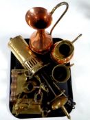 A tray of antique and later metal wares : brass and copper jugs, brass companion pieces,