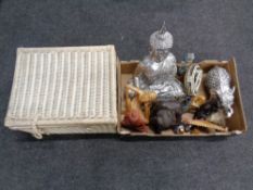 A box containing ornaments to include Buddha figures, tambourines, wooden pipes,