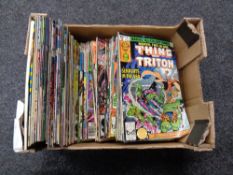 A box containing 20th century Marvel comics,