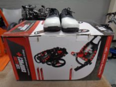 An Eze glide compact folding golf trolley (boxed) together with a pair of Dunlop golf shoes