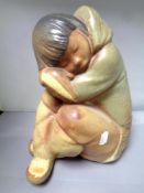 A Lladro figure - sleeping Eskimo boy,