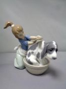A Lladro figure - bashful bather