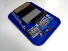 A tray containing four boxed pens to include Waterman pen with gold nib, Parker,