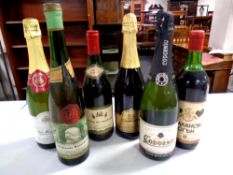 A tray of six assorted bottles of champagne and wine