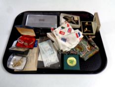 A vintage wristwatch, scarves, badges,