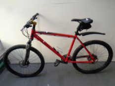 A Carrera XC Valkan Disc Spec front suspension mountain bike