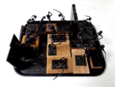 A tray of collection of metal sporting sculptures