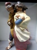 A Lladro figure - Facing the Wind,