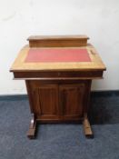 A 19th century inlaid mahogany Davenport