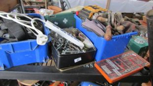 A shelf full of gloves/straps/clamps/ u bolts and a tap and die set.