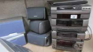 An Aiwa music centre with speakers, tested and working,