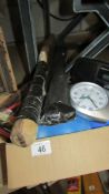 A box of new ice packs, a radio alarm clock, a DAB Radio clock, a new watch repair kit,
