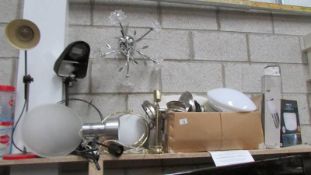 A good lot of new and used lighting including vintage angle poise lamp and new ceiling fan in box.