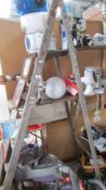 A wooden step ladder,