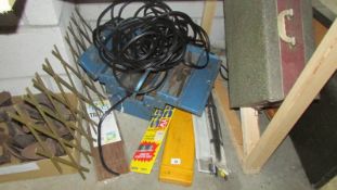 A cantilever tool box with tools, various wiper blades etc.