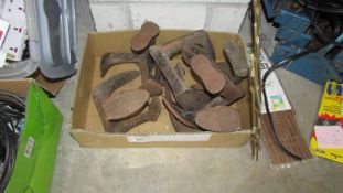 A large box of shoe lasts,