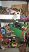 Three shelves of workshop tools including block and tackle etc.