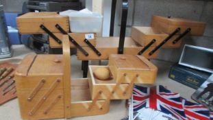 Two cantilever wooden sewing boxes,