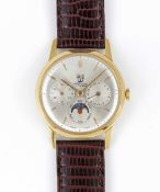 A GENTLEMAN'S YELLOW GOLD PLATED MERVOS TRIPLE CALENDAR MOONPHASE WRIST WATCH CIRCA 1960s, REF.