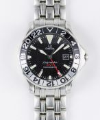 A GENTLEMAN'S STAINLESS STEEL OMEGA SEAMASTER GMT CHRONOMETER BRACELET WATCH DATED 2003, REF. 2234.