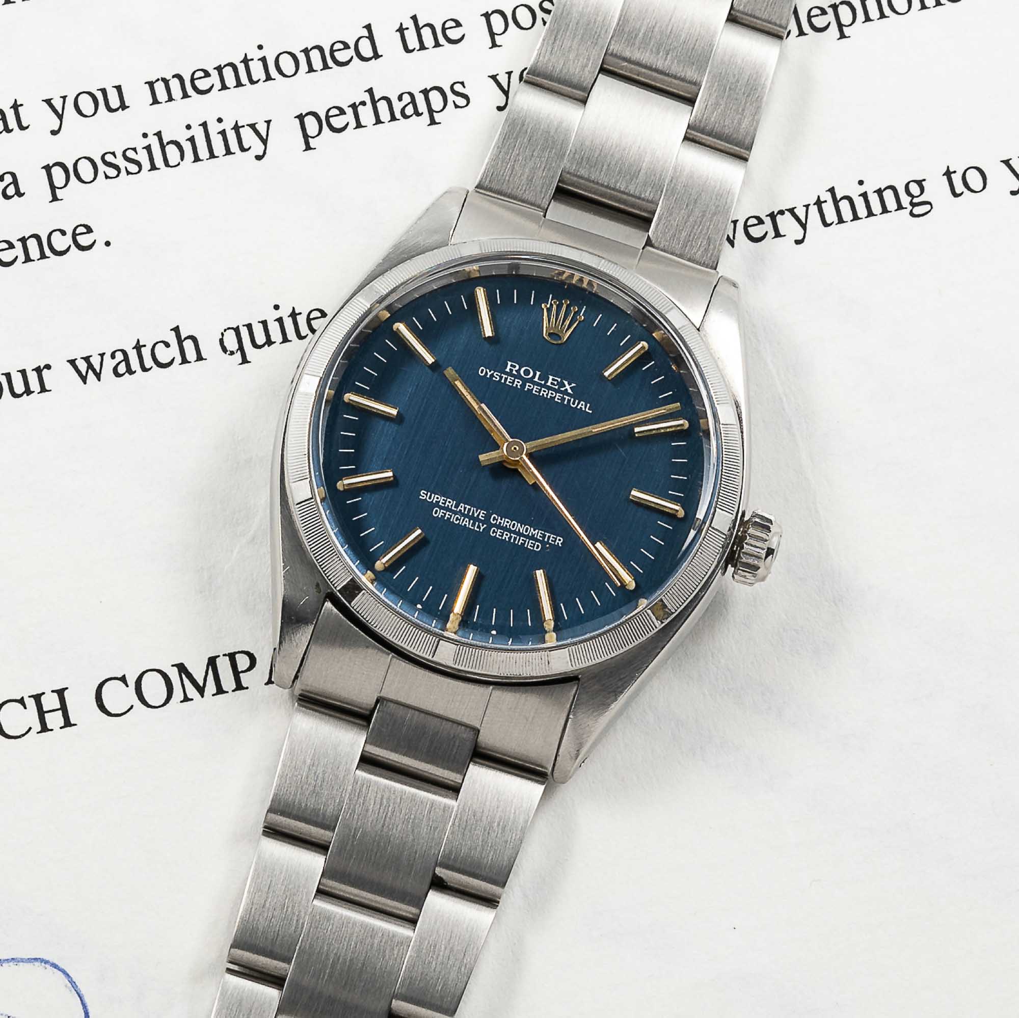 A GENTLEMAN'S STAINLESS STEEL ROLEX OYSTER PERPETUAL BRACELET WATCH CIRCA 1961, REF. 1003 WITH