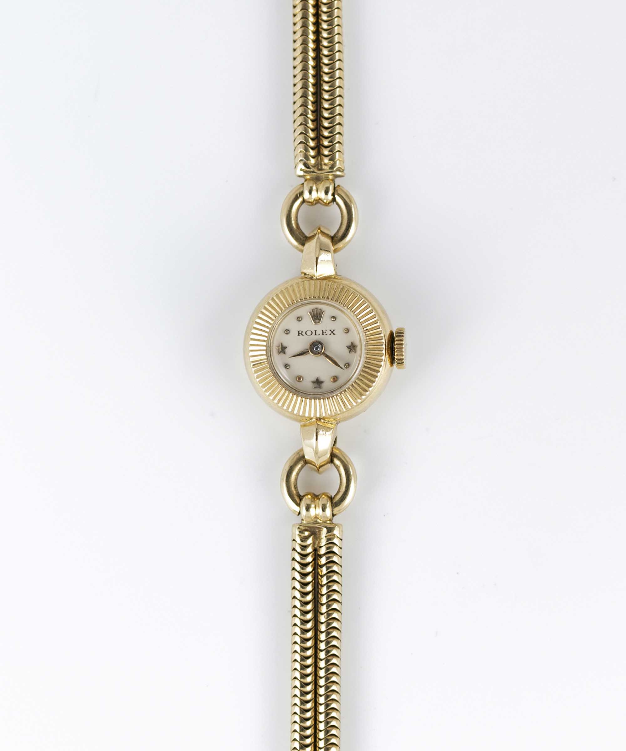 A LADIES 18K SOLID YELLOW GOLD ROLEX BRACELET WATCH CIRCA 1953, REF. 8646 WITH STAR INDICES AT 3-6-9