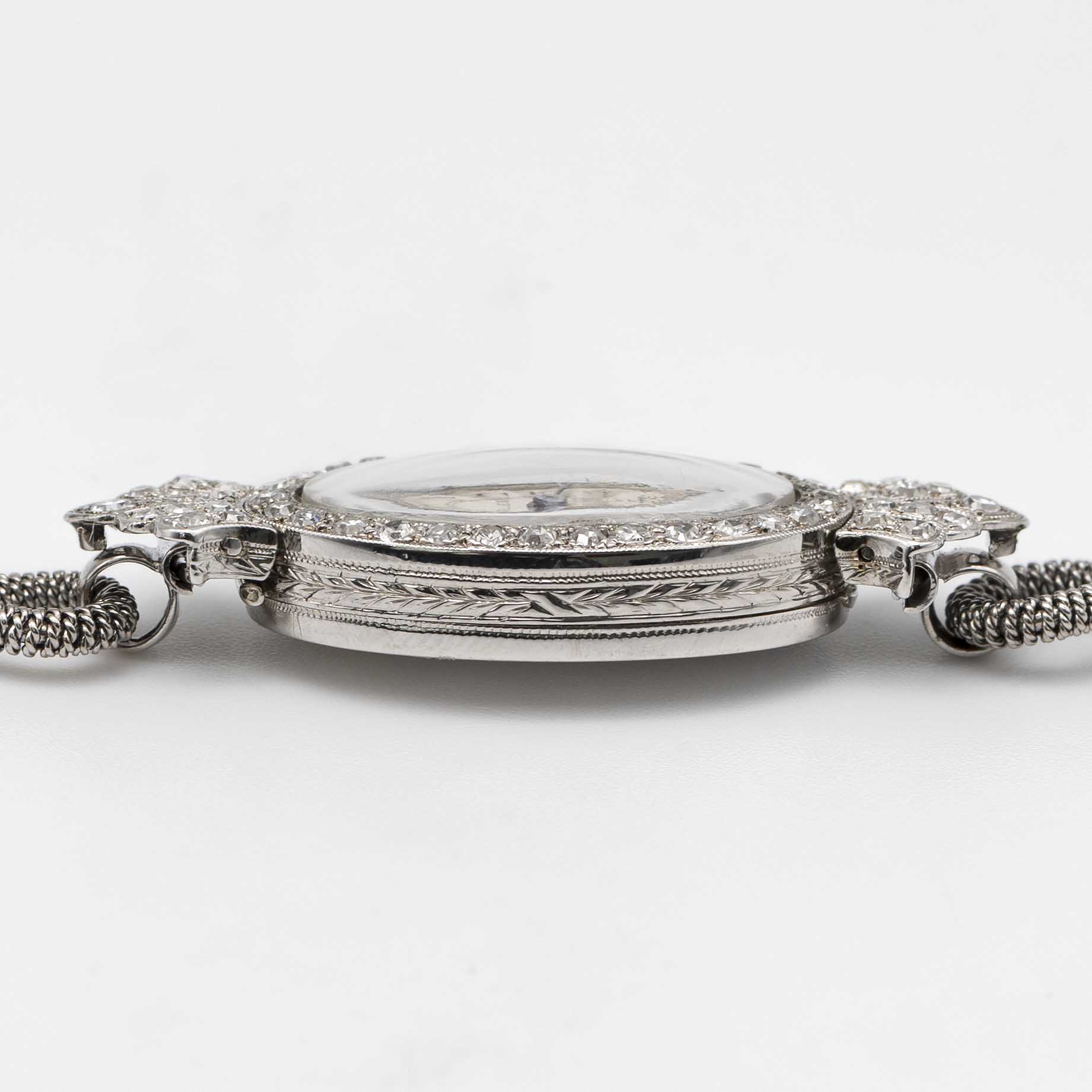 A LADIES FINE SOLID WHITE GOLD & DIAMOND ROLEX COCKTAIL BRACELET WATCH CIRCA 1926, WITH GUILLOCHE - Image 9 of 10