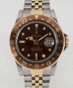 A GENTLEMAN'S STEEL & GOLD ROLEX OYSTER PERPETUAL GMT MASTER 