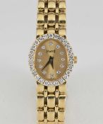 A FINE 18K LADIES SOLID GOLD & DIAMOND PIAGET BRACELET WATCH CIRCA 1990s, REF 8326 K 61 WITH