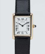 A GENTLEMAN'S SIZE 18K SOLID GOLD CARTIER PARIS TANK LOUIS MECANIQUE WRIST WATCH CIRCA 1980, REF.