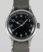 A GENTLEMAN'S STAINLESS STEEL BRITISH MILITARY OMEGA RAF PILOTS WRIST WATCH DATED 1956, WITH BLACK