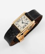 A GENTLEMAN'S SIZE 18K SOLID GOLD CARTIER PARIS TANK 