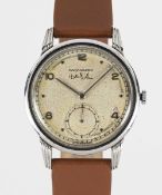 A RARE GENTLEMAN'S STAINLESS STEEL MOVADO WRIST WATCH CIRCA 1940s, COMMISSIONED BY THE FIRST KING OF