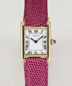 A LADIES 18K SOLID GOLD CARTIER TANK LOUIS MECANIQUE WRIST WATCH CIRCA 1980, REF. 78087  Movement:
