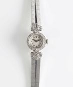 A LADIES 18K SOLID WHITE GOLD & DIAMOND ROLEX PRECISION BRACELET WATCH CIRCA 1960s, WITH ORIGINAL