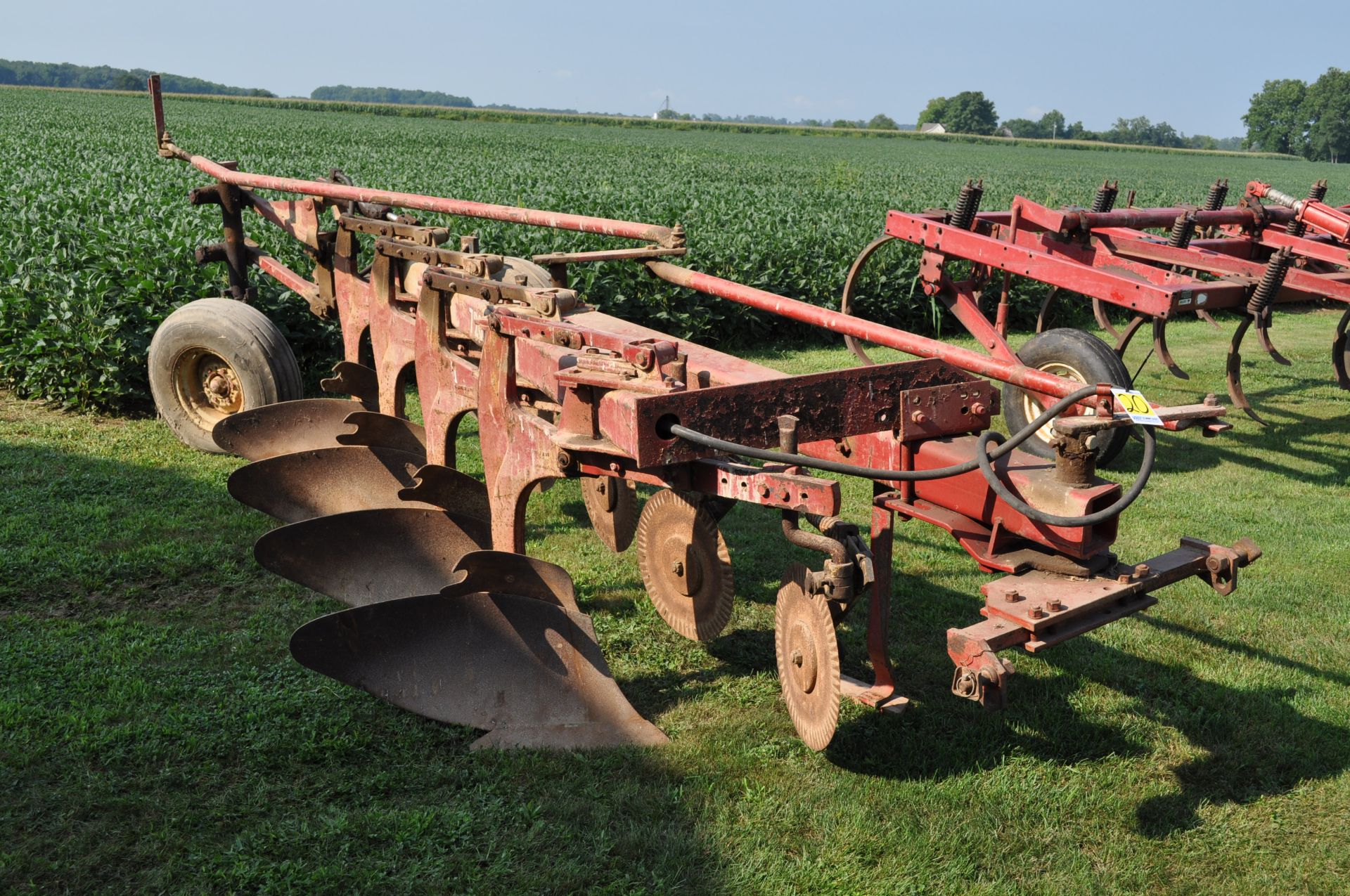 International 720 moldboard plow, 4x16”, toggle trip, semi mount