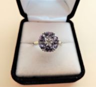 Sterling Silver Tanzanite & Diamond Cluster Ring