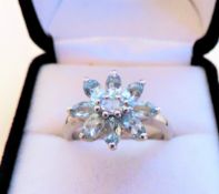 Blue Topaz Flower Cluster Ring in Sterling Silver