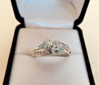 Blue Topaz Sterling Silver Crossover Ring