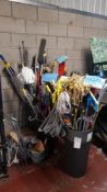A Large Quantity Of Mixed Cleaning Items To Include Brushes, Mops, 3 Tier Airer & Clothes Hange...