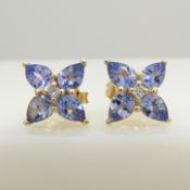 9ct yellow gold tanzanite and diamond stud earrings, boxed.