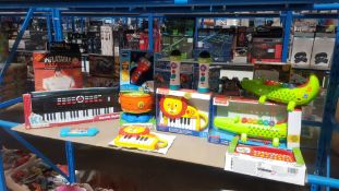 12 Items : To Include 2 X Fisher Price Crocodile Xylophone, 2 X Mini Lion Piano 1 X Little Tikes Al
