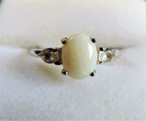 Sterling Silver 1.10 carat Opal & Topaz Ring