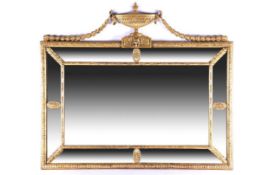 C19th Adams style mirror with urn and swags