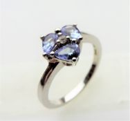 1.2 carat Tanzanite & Topaz Ring