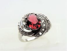 1.4 carat Garnet & Topaz Ring