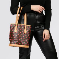Luxury Pre-Owned Handbags I Featuring a Fendi Brown Zucca Monogram Canvas Vintage Trunk, Originally Owned by Karl Lagerfeld.