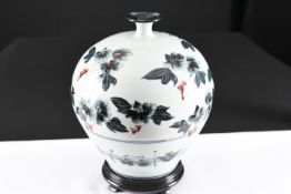 White Vase with Black, Blue, Red Flowers