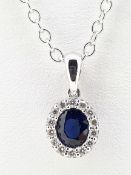 18ct White Gold 0.56ct Sapphire & Diamond Oval Cluster Pendant on Trace Chain - 20