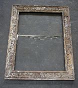 A large carved oak frame possibly Indian
